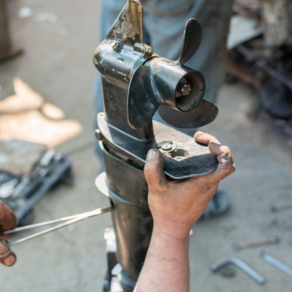 repair a gasoline outboard marine engine