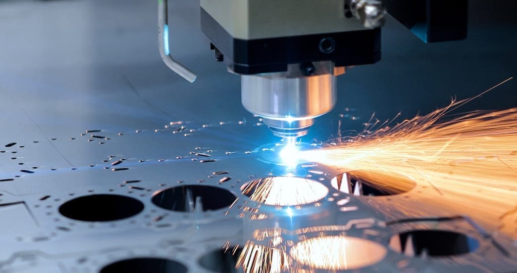 A laser cutting sheet metal.